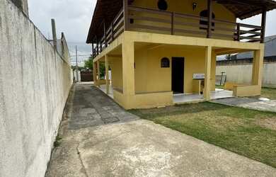 Imagem: A casa possui 3 Dormitórios, 3 Banheiros, 5 Vagas na garagem
