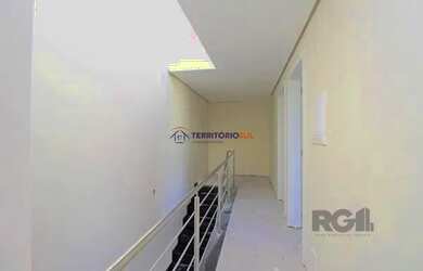 Imagem 16: Casa em Porto Alegre, no bairro Hípica, com 3 dormitório s , e 3 banheiros,...