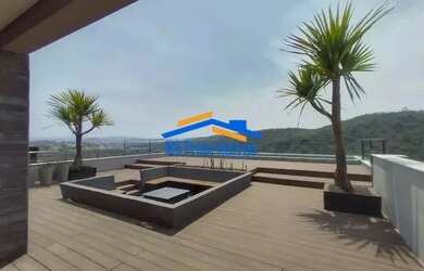 Imagem: A casa em condomínio possui 4 Dormitórios, 5 Banheiros, 4