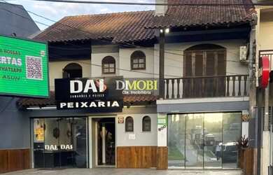 Imagem: A casa possui 3 Dormitórios, 4 Banheiros, 239m² de Área