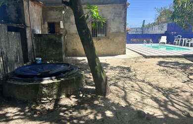 Imagem: A casa possui 3 Dormitórios, 3 Banheiros, 4 Vagas na garagem