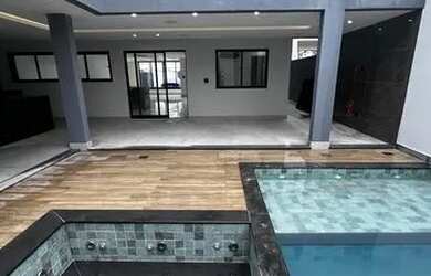 Imagem: A casa em condomínio possui 5 Dormitórios, 5 Banheiros, 3