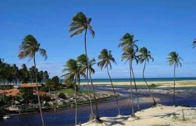 Imagem: A casa possui 3 Dormitórios, 2 Vagas na garagem e está localizado