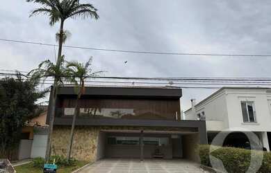 Imagem: A casa em condomínio possui 4 Dormitórios, 5 Banheiros, 5