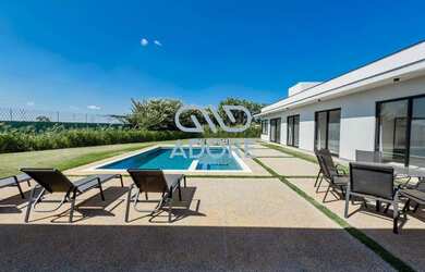 Imagem: A casa em condomínio possui 5 Dormitórios, 5 Banheiros, 4