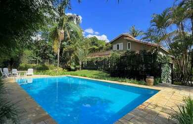 Imagem: A casa em condomínio à venda possui 5 Dormitórios, 5 Banheiros