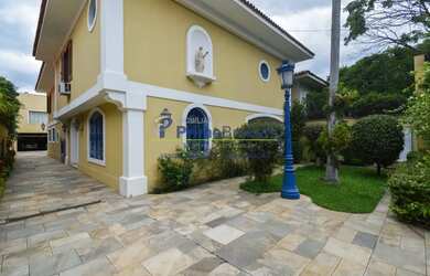 Imagem: A casa possui 4 Dormitórios, 5 Banheiros, 5 Vagas na garagem