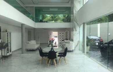 Imagem: A casa possui 3 Dormitórios, 5 Banheiros, 5 Vagas na garagem