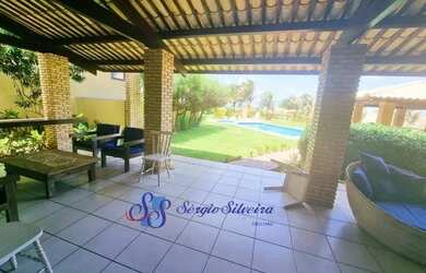 Imagem 10: Belíssima mansão no Porto das Dunas frente mar pé na areia com 8 suítes