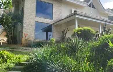 Imagem: A casa possui 4 Dormitórios, 5 Banheiros, 5 Vagas na garagem