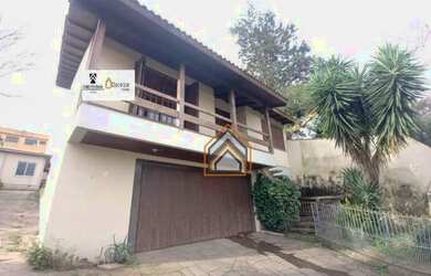 Imagem: A casa possui 5 Dormitórios, 5 Banheiros, 5 Vagas na garagem