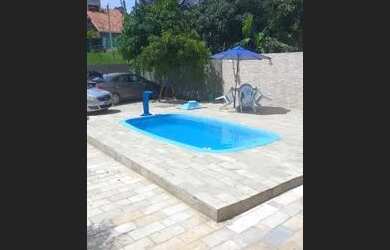 Imagem: A casa possui 3 Dormitórios, 3 Banheiros, 4 Vagas na garagem