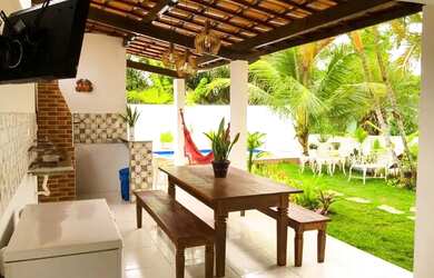 Imagem: A casa em condomínio possui 4 Dormitórios, 5 Banheiros, 2