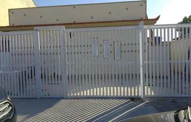 Imagem: A casa possui 2 Dormitórios, 1 Banheiro, 1 Vaga na garagem