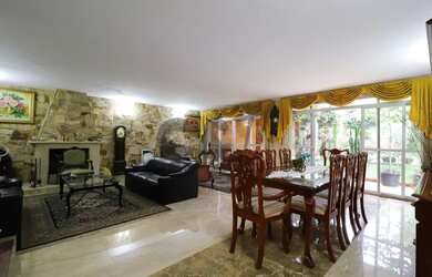 Imagem: A casa à venda possui 4 Dormitórios, 4 Banheiros, 4 Vagas