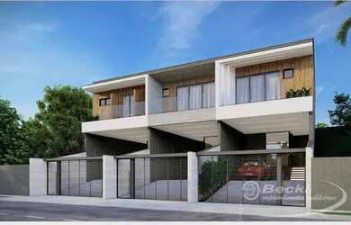 Imagem: A casa possui 3 Dormitórios, 3 Banheiros, 4 Vagas na garagem