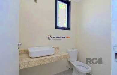 Imagem 12: Casa em Porto Alegre, no bairro Hípica, com 3 dormitório s , e 3 banheiros,...