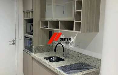 Imagem: O apartamento possui 1 Dormitório, 1 Banheiro, 1 Vaga na garagem