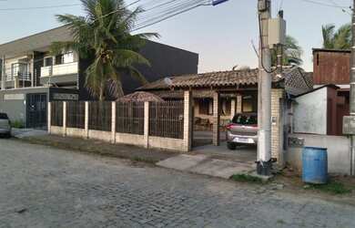 Imagem: A casa possui 2 Dormitórios, 2 Vagas na garagem e está localizado