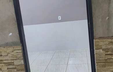 Imagem: A casa possui 2 Dormitórios, 1 Banheiro, 1 Vaga na garagem