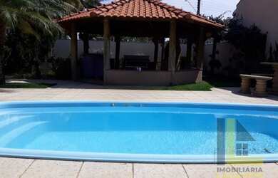 Imagem: A casa possui 2 Dormitórios, 2 Banheiros, 3 Vagas na garagem