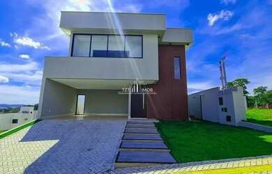 Imagem: A casa possui 4 Dormitórios, 5 Banheiros, 4 Vagas na garagem