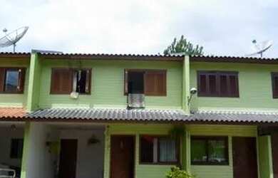 Imagem: A casa possui 3 Dormitórios, 1 Banheiro, 1 Vaga na garagem