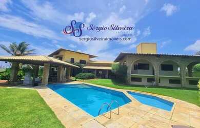 Imagem 1: Belíssima mansão no Porto das Dunas frente mar pé na areia com 8 suítes