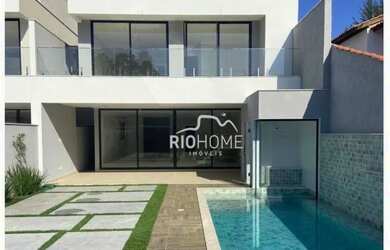 Imagem: A casa em condomínio possui 5 Dormitórios, 5 Banheiros, 2