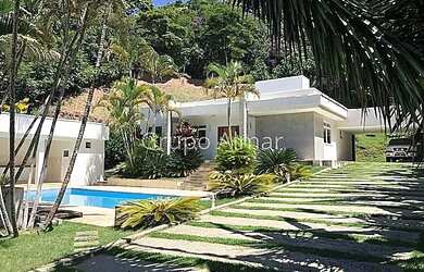 Imagem: A casa possui 5 Dormitórios, 5 Banheiros, 2 Vagas na garagem