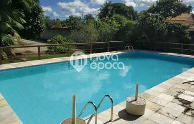 Imagem: A casa possui 5 Dormitórios, 3 Banheiros, 5 Vagas na garagem