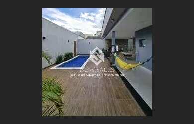 Imagem: A casa possui 3 Dormitórios, 5 Banheiros, 4 Vagas na garagem