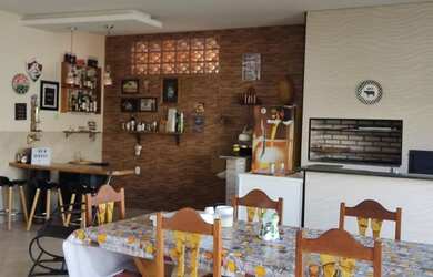 Imagem: A casa em condomínio possui 4 Dormitórios, 4 Banheiros, 3