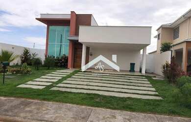 Imagem: A casa possui 3 Dormitórios, 3 Banheiros, 4 Vagas na garagem