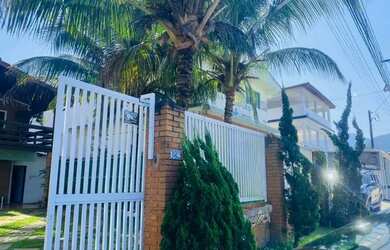 Imagem: A casa possui 3 Dormitórios, 3 Vagas na garagem e está localizado