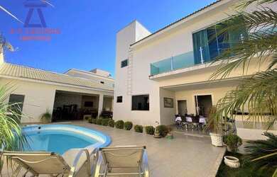 Imagem: A casa possui 4 Dormitórios, 3 Banheiros, 5 Vagas na garagem