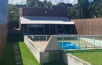 Imagem: A casa possui 3 Dormitórios, 2 Vagas na garagem e está localizado