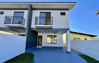 Imagem: A casa possui 3 Dormitórios, 3 Banheiros, 2 Vagas na garagem