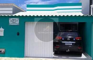 Imagem: A casa possui 4 Dormitórios, 2 Banheiros, 2 Vagas na garagem