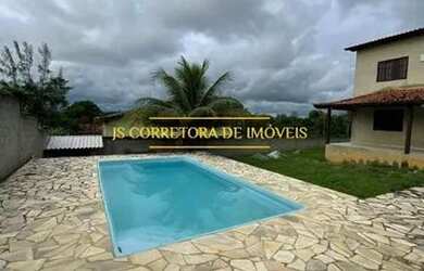 Imagem: A casa possui 4 Dormitórios, 1 Banheiro, 4 Vagas na garagem