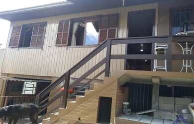 Imagem: A casa possui 3 Dormitórios, 1 Banheiro, 90m² de Área e