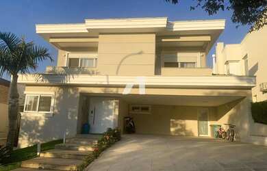 Imagem: A casa em condomínio possui 4 Dormitórios, 5 Banheiros, 4