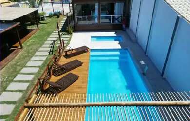 Imagem: A casa em condomínio possui 4 Dormitórios, 5 Banheiros, 2