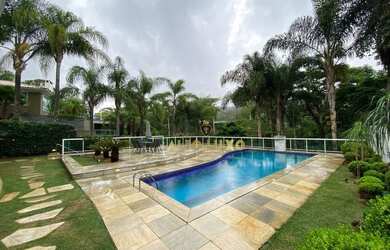 Imagem: A casa em condomínio possui 4 Dormitórios, 5 Banheiros, 5