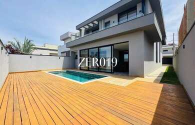 Imagem: A casa em condomínio possui 4 Dormitórios, 5 Banheiros, 4