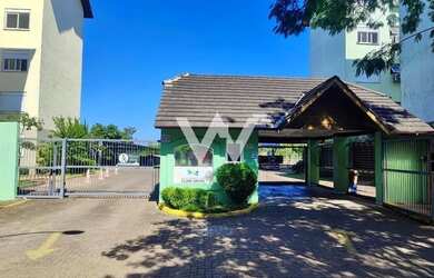 Imagem: O apartamento possui 2 Dormitórios, 1 Banheiro, 1 Vaga na garagem