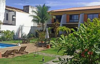 Imagem: A casa possui 2 Dormitórios e está localizado em Praia do