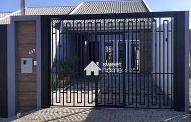 Imagem: A casa possui 3 Dormitórios, 2 Banheiros, 2 Vagas na garagem