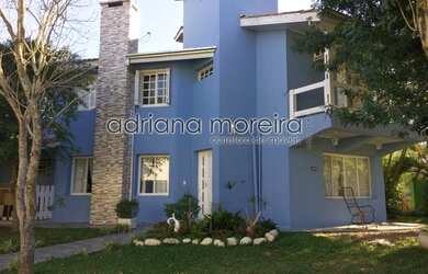 Imagem: A casa em condomínio possui 3 Dormitórios, 3 Banheiros, 234m²