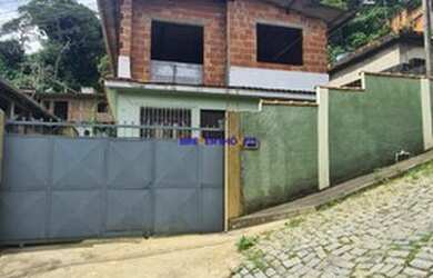 Imagem: A casa possui 2 Dormitórios, 1 Banheiro, 5 Vagas na garagem